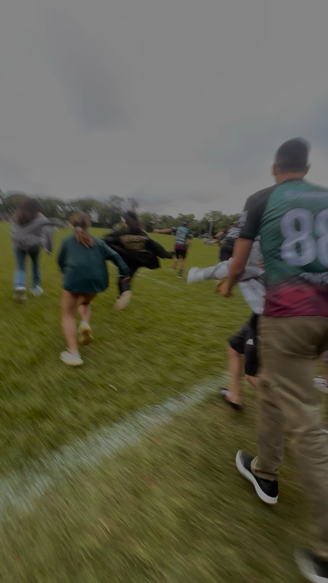 Running onto the pitch after the final whistle