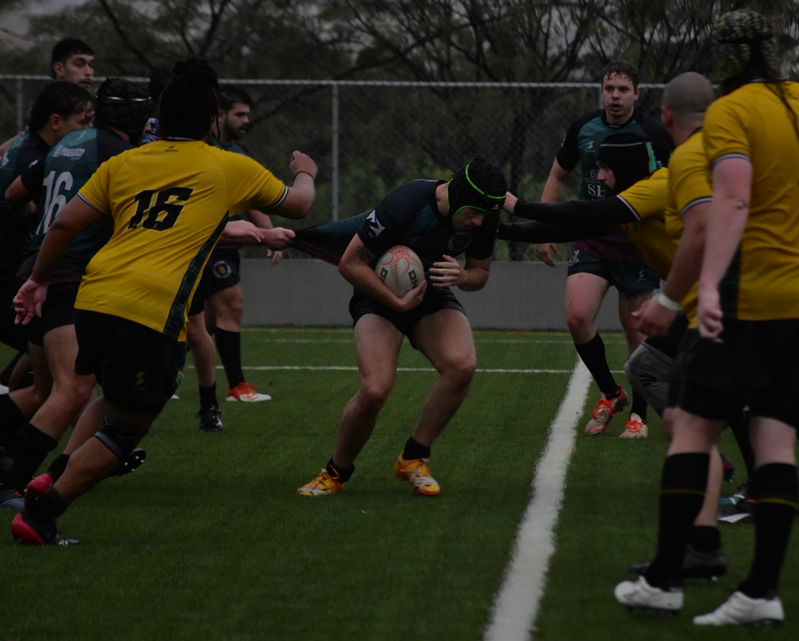 Fighting through a shirt-pull near the touchline