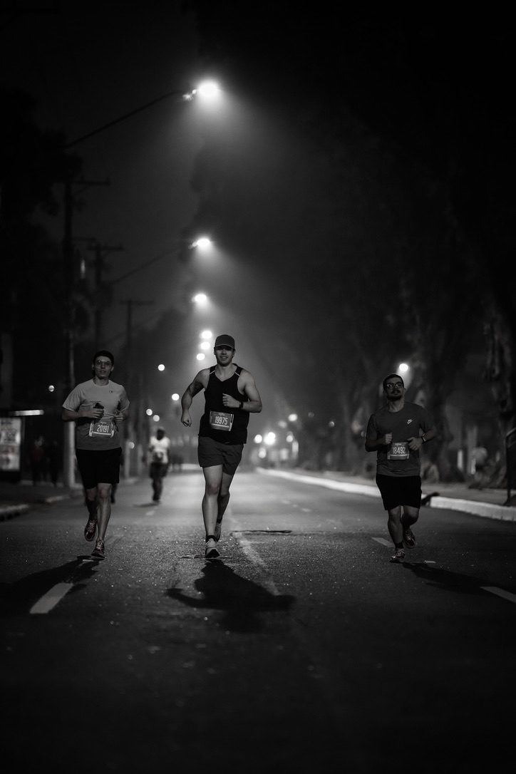 Racing under the streetlights before sunrise